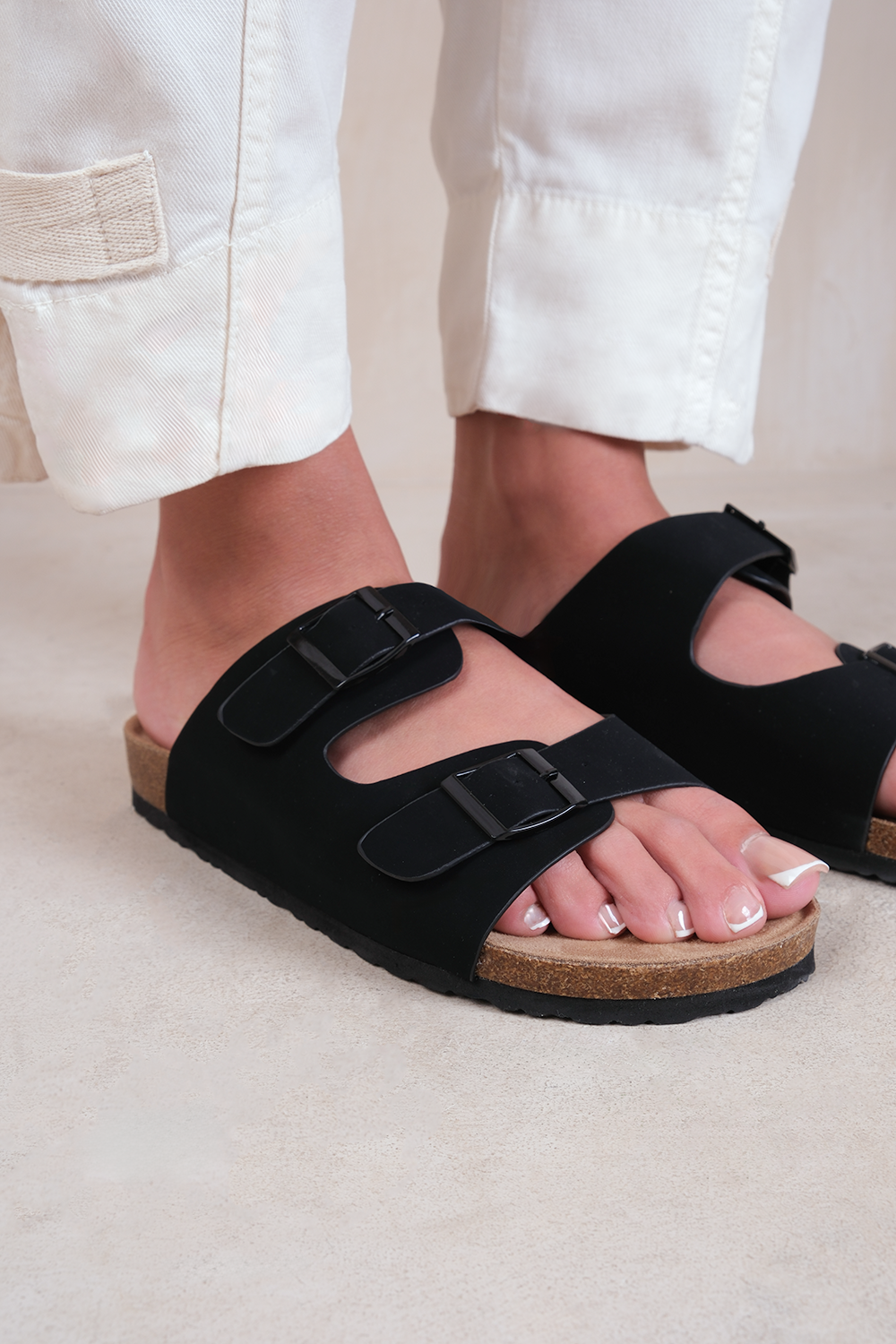 WILLOW TWO STRAP FLAT SANDALS WITH BUCKLE DETAIL IN BLACK NUBUCK