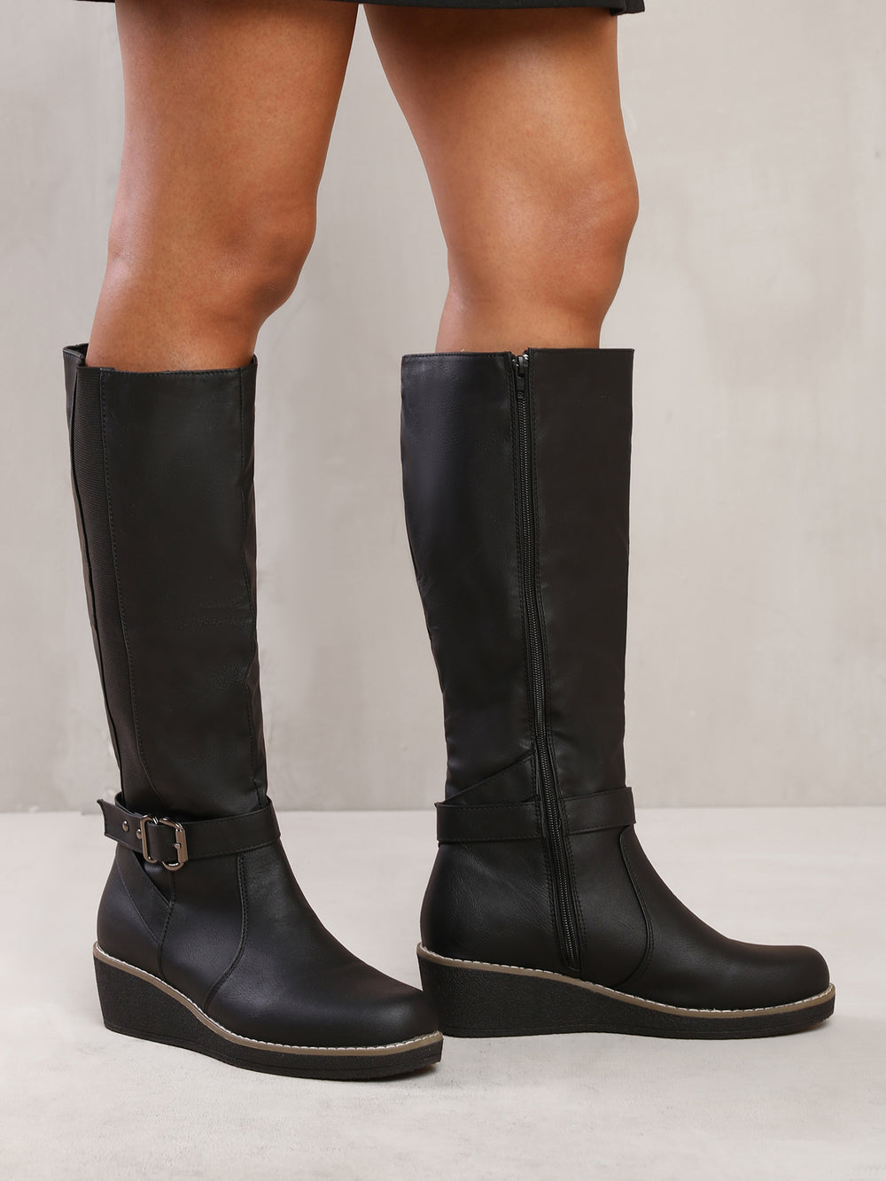 AYLEEN WEDGE HEEL KNEE HIGH BOOTS WITH ELASTIC PANEL IN BLACK FAUX LEATHER