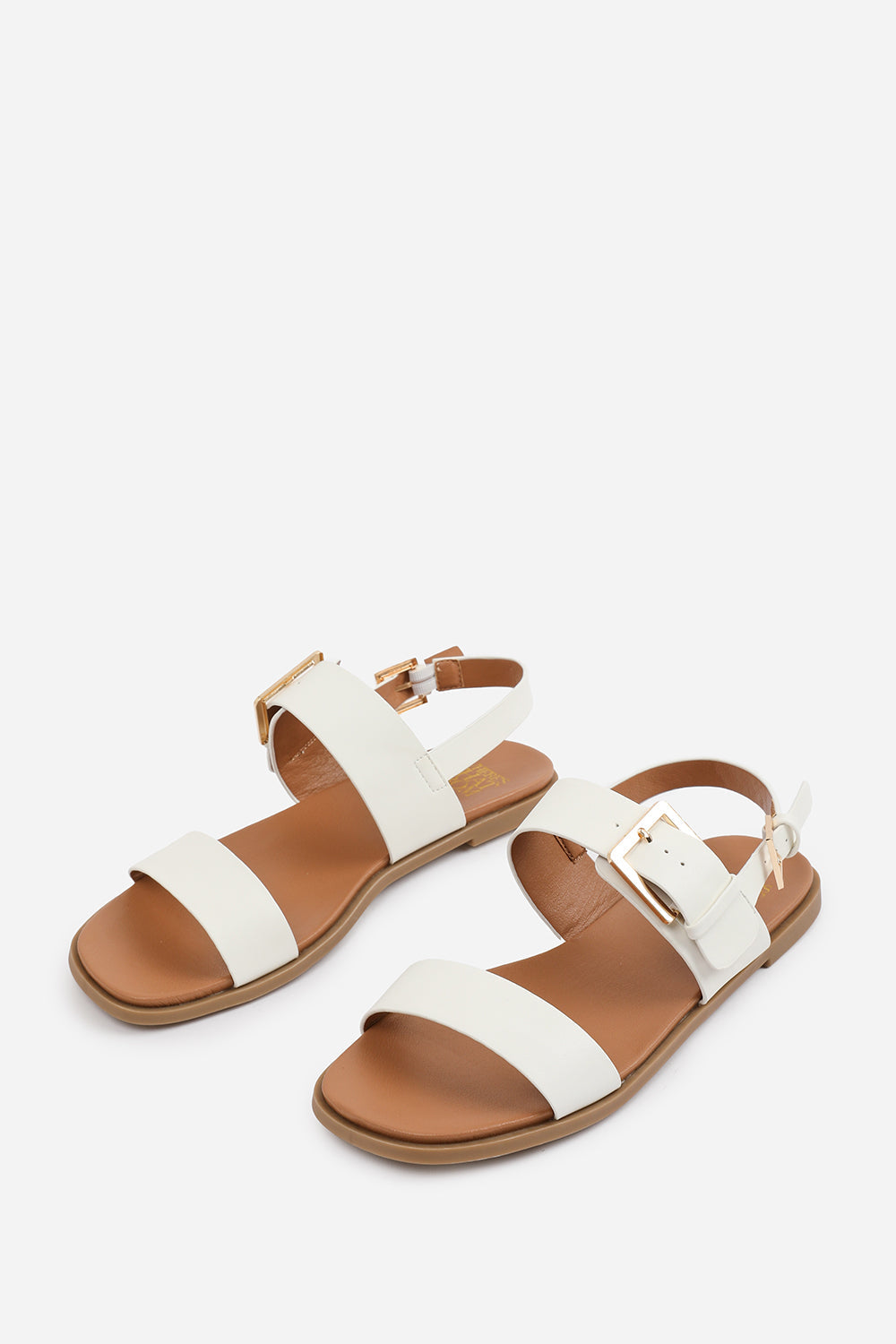 CAMILLA CLASSIC FLAT SANDALS WITH STRAP AND BUCKLE DETAIL IN WHITE FAUX LEATHER