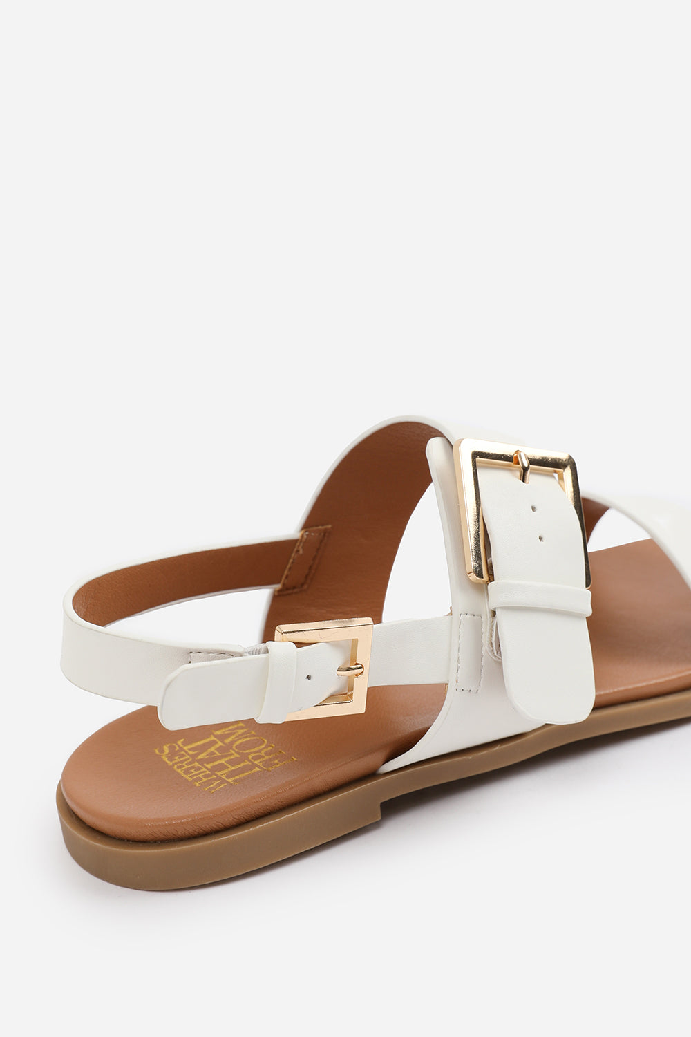 CAMILLA CLASSIC FLAT SANDALS WITH STRAP AND BUCKLE DETAIL IN WHITE FAUX LEATHER