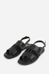 UMA WIDE FIT FLAT SANDALS WITH MULTI STRAP DETAIL AND BUCKLE CLOSURE IN BLACK