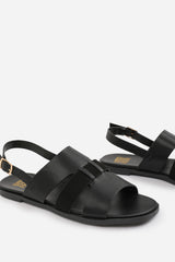 UMA WIDE FIT FLAT SANDALS WITH MULTI STRAP DETAIL AND BUCKLE CLOSURE IN BLACK