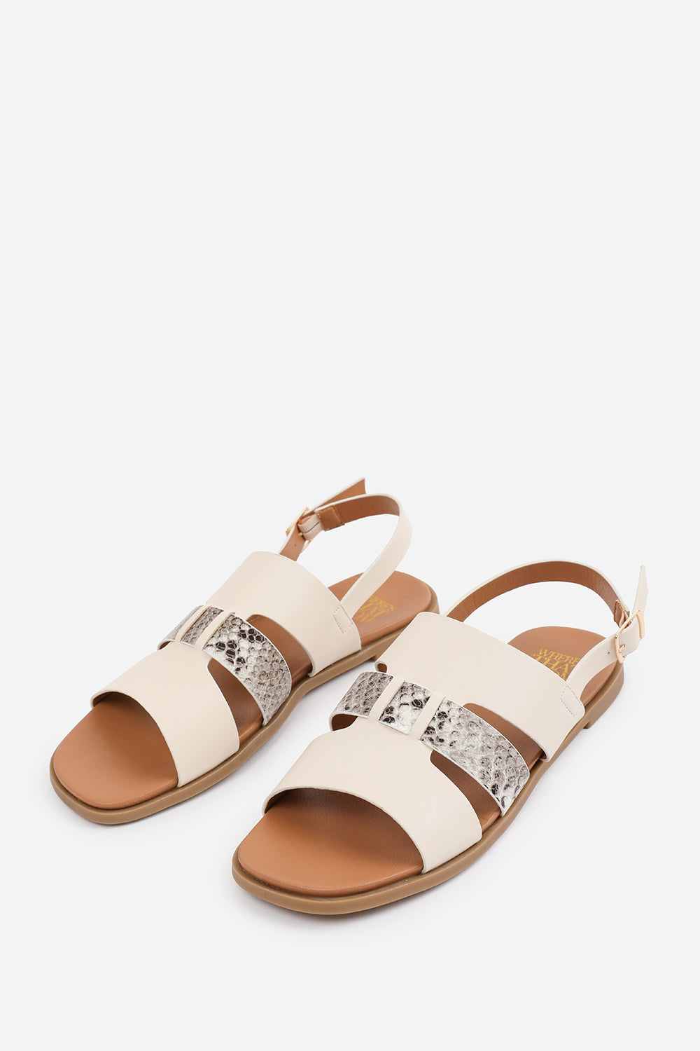 UMA FLAT SANDALS WITH MULTI STRAP DETAIL AND BUCKLE CLOSURE IN CREAM