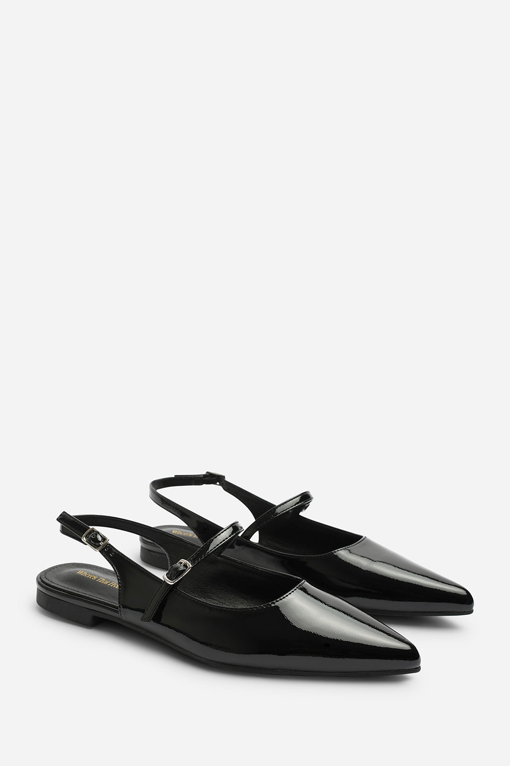 Estrella Pointed Toe Mary Jane Open Back Ballet Flats In Black Patent