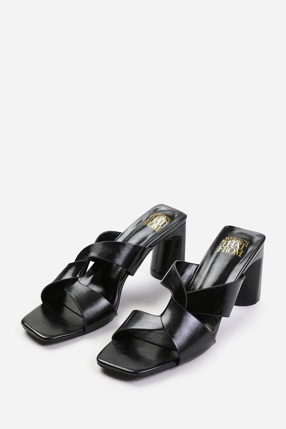 MANILA TWIST OVER STRAP BLOCK HEEL MULES IN BLACK FAUX LEATHER