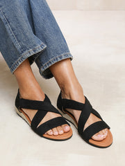 HUMMINGBIRD LOW WEDGE SHOES WITH CROSS OVER STRAP IN BLACK SUEDE