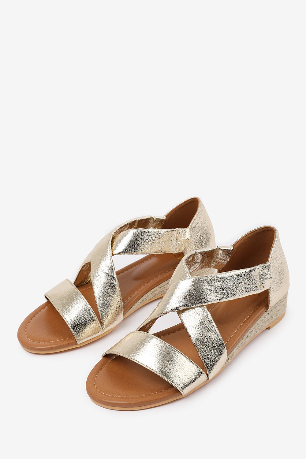 HUMMINGBIRD LOW WEDGE SHOES WITH CROSS OVER STRAP IN GOLD METALLIC