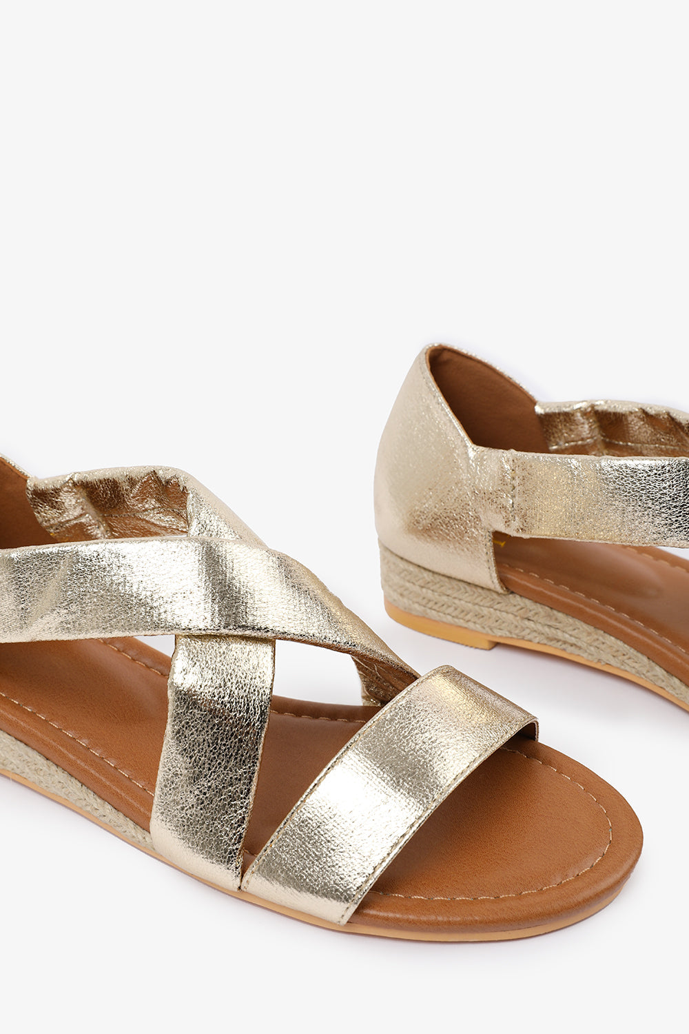 HUMMINGBIRD WIDE FIT LOW WEDGE SHOES WITH CROSS OVER STRAP IN GOLD METALLIC