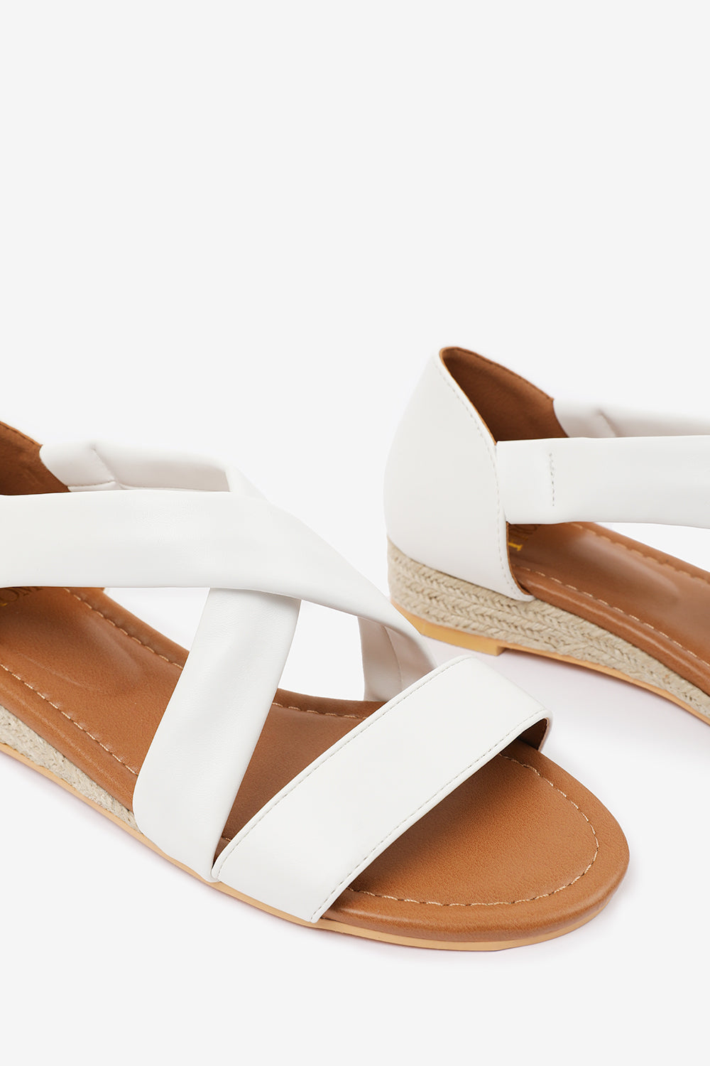 HUMMINGBIRD LOW WEDGE SHOES WITH CROSS OVER STRAP IN WHITE