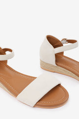 ELEANOR WIDE FIT LOW WEDGE SHOES WITH ADJUSTABLE ANKLE STRAP IN CREAM SUEDE