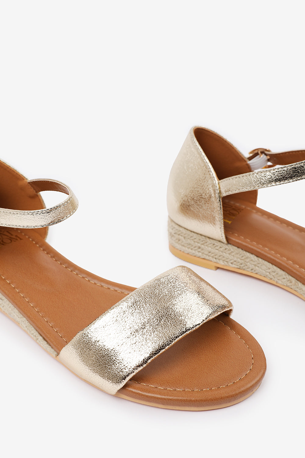 ELEANOR LOW WEDGE SHOES WITH ADJUSTABLE ANKLE STRAP IN GOLD METALLIC FAUX LEATHER