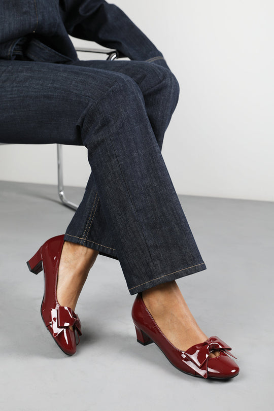 Georgia Wide Fit Mid Heel Court Shoes With Bow Detail In Cherry Patent Finish