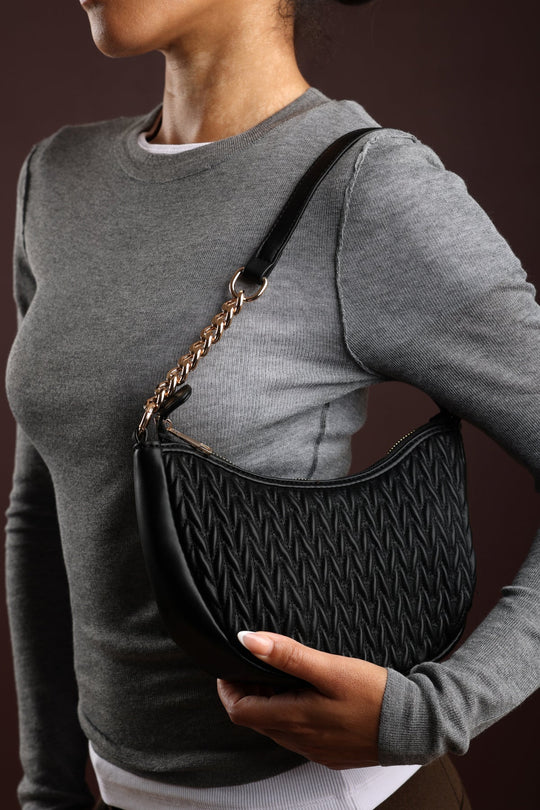 Belleza Quilted Crescent Shoulder Bag in Chain Detail in Black Faux Leather