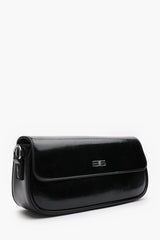 Arena Baguette Shoulder Bag in Black Faux Leather