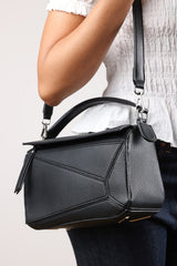 Abrazo Geometric Top Handle Bag in Black
