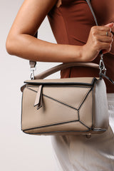 Abrazo Geometric Top Handle Bag in Taupe