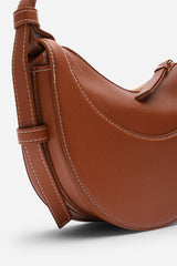 Envie Crescent Faux Leather Shoulder Bag in Tan