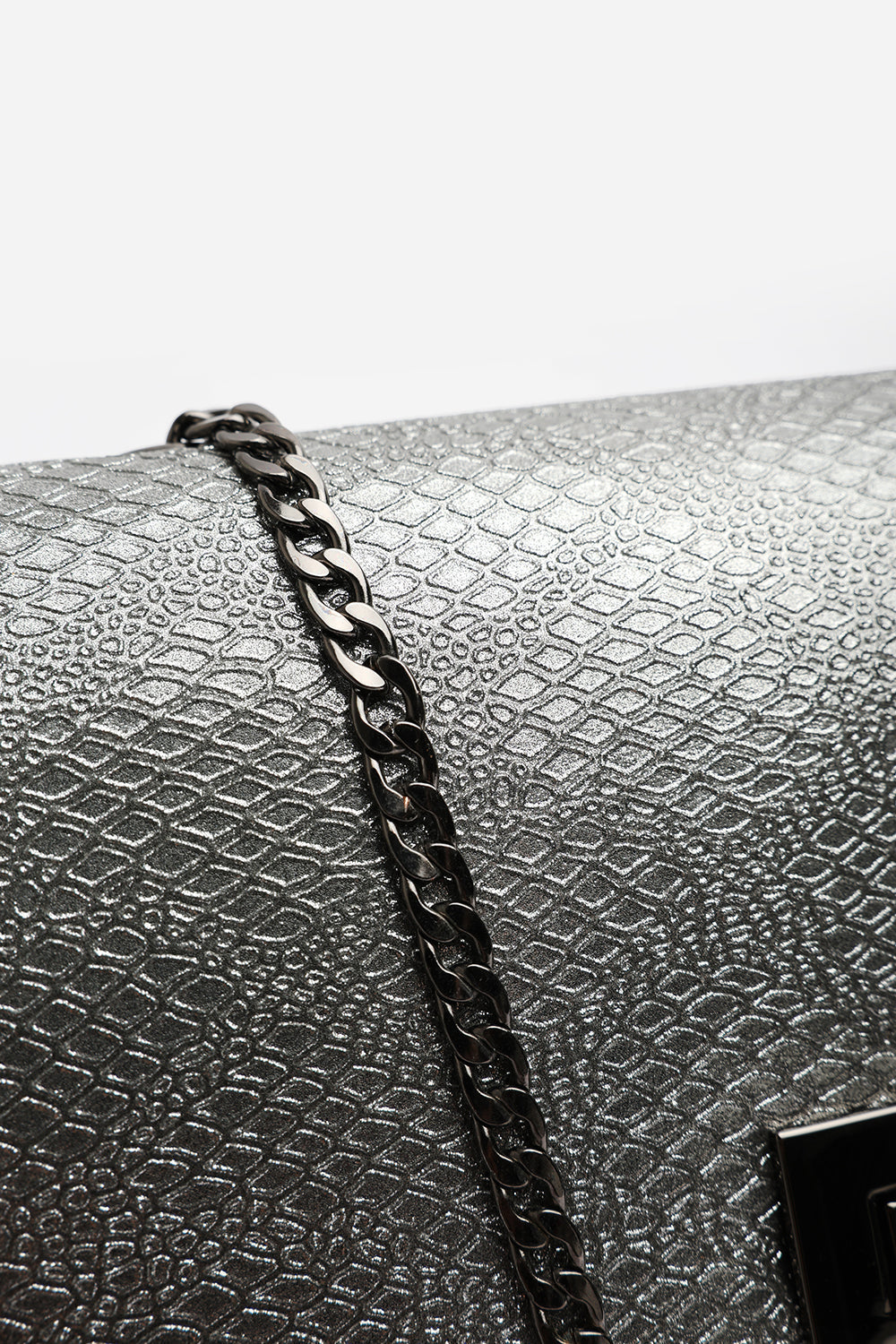 Lurexa Silver Metalic Snake Clutch & Crossbody Bag With Twist Lock Detail and Chain