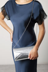 Moxira Asymetric Envelope Cltuch Bag In Silver Metallic
