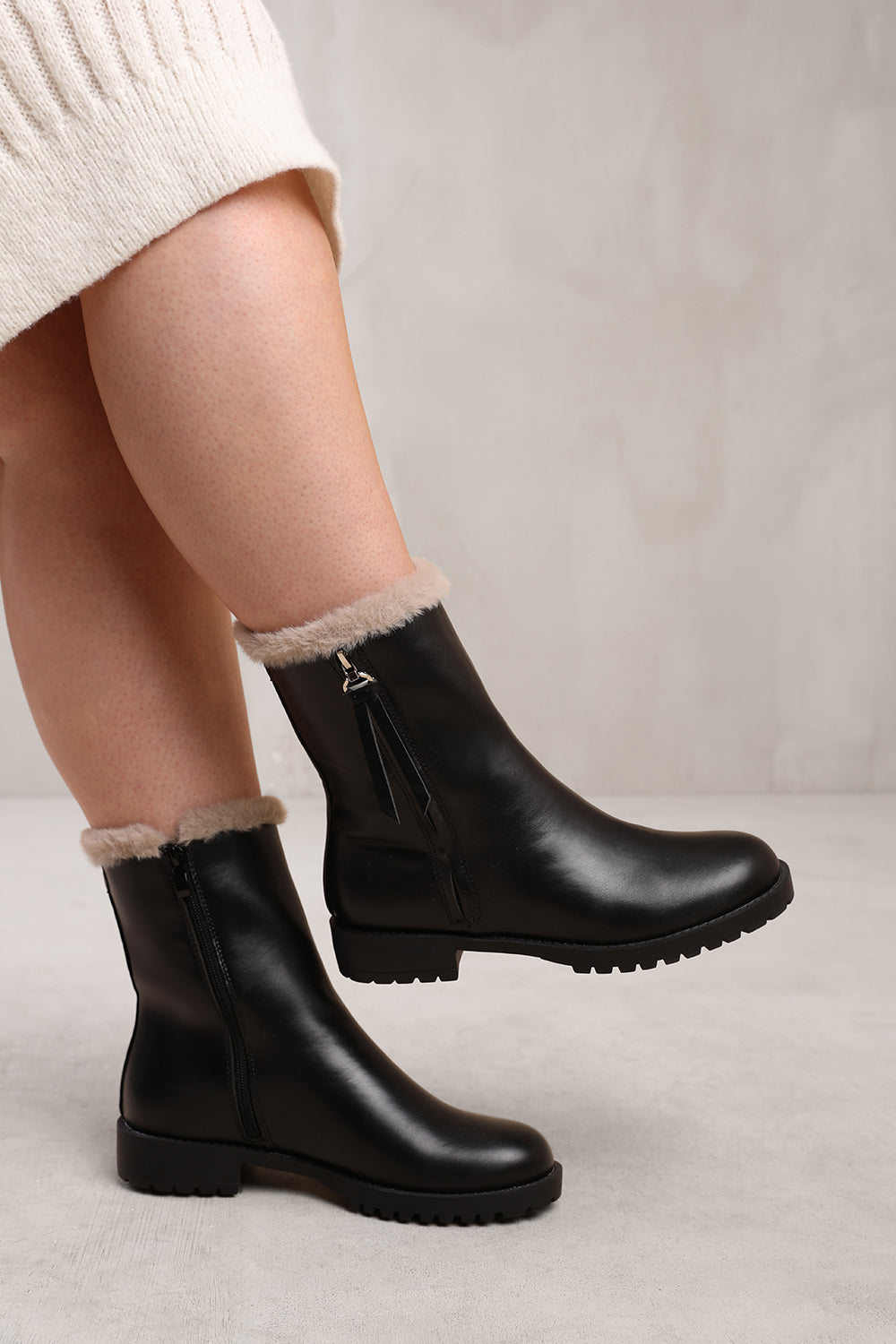 ARTIC MID CALF BOOT WITH FUR TRIM IN BLACK FAUX LEATHER