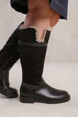 KENDRA WIDE CALF KNEE HIGH BOOTS WITH FUR TRIM AND LINING IN WIDE E FIT IN BLACK SUEDE AND FAUX LEATHER