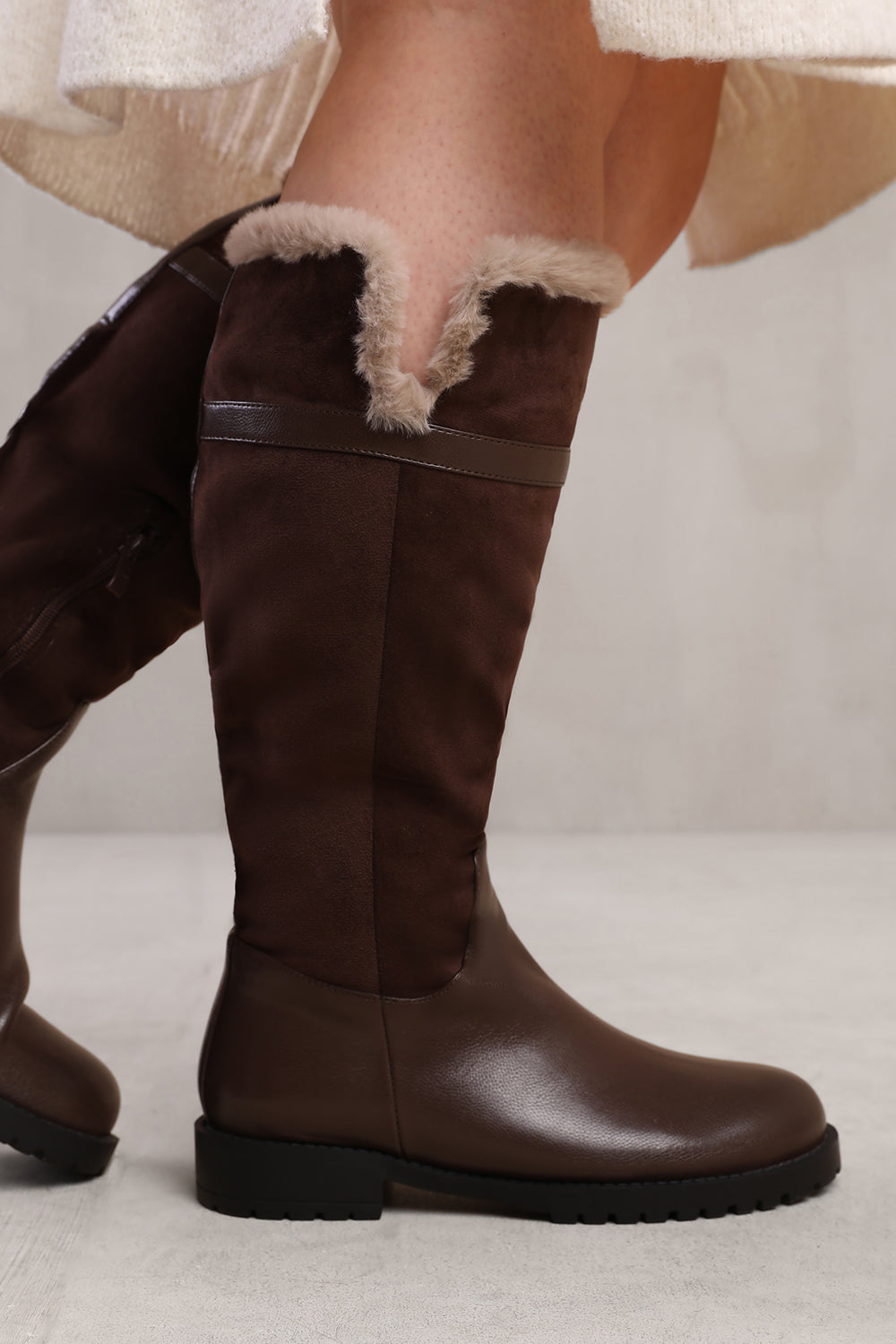 Tall boots with fur trim sales