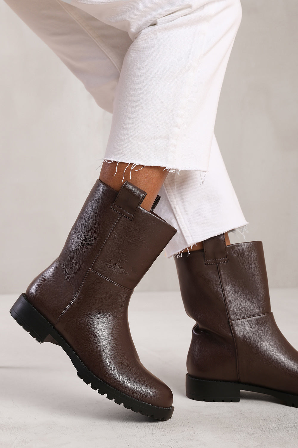 DELTA MID CALF BOOT WITH STITCHING DETAIL IN DARK BROWN GRAIN FAUX LEATHER