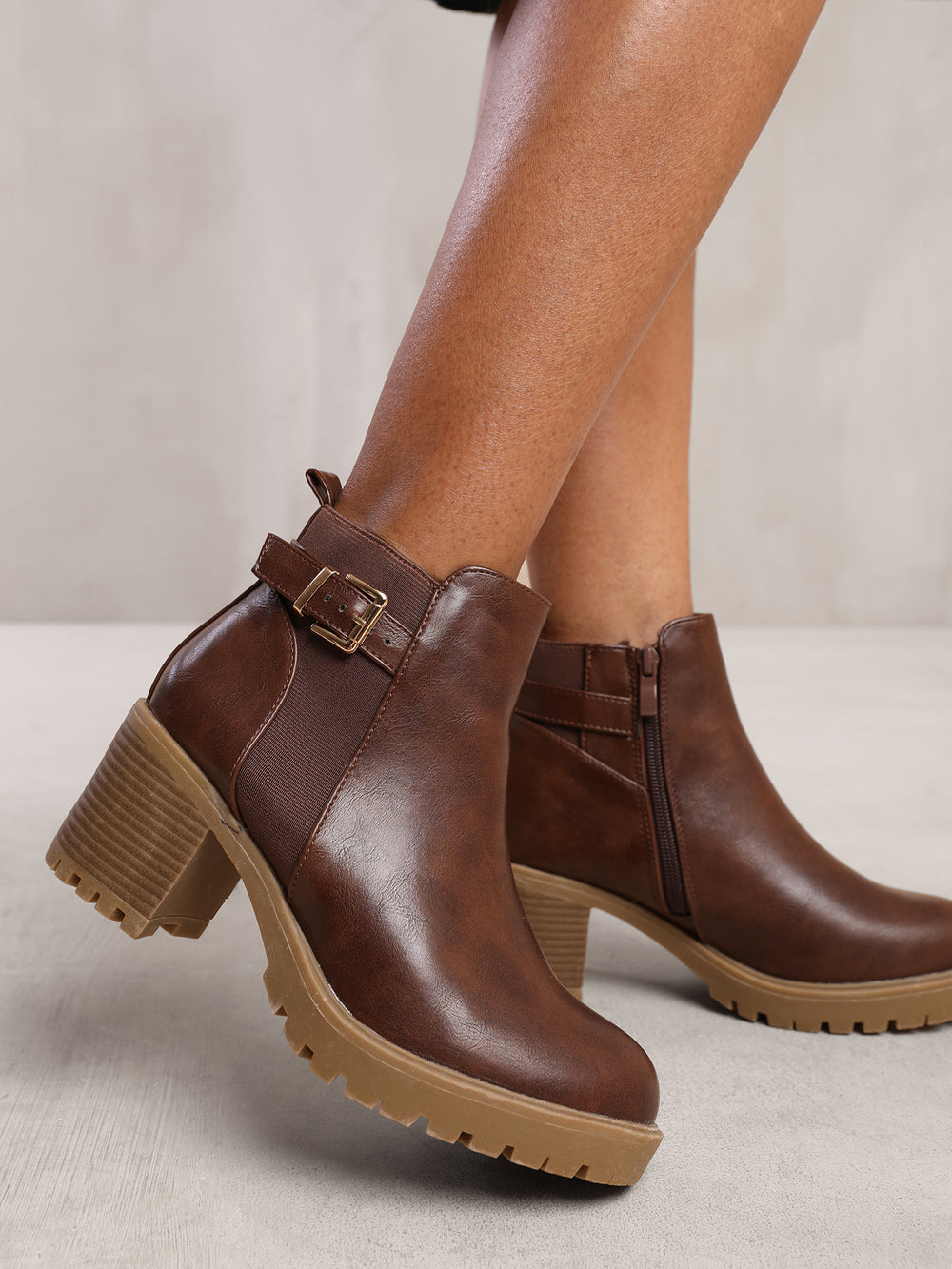 KALI MID BLOCK HEEL WITH BUCKLE DETAIL STRETCH ANKLE BOOTS IN BROWN FAUX LEATHER