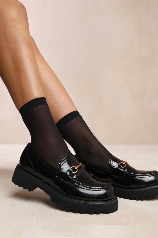 MURIEL CHUNKY SOLE SLIP ON LOAFERS WITH METAL DETAIL IN BLACK PATENT