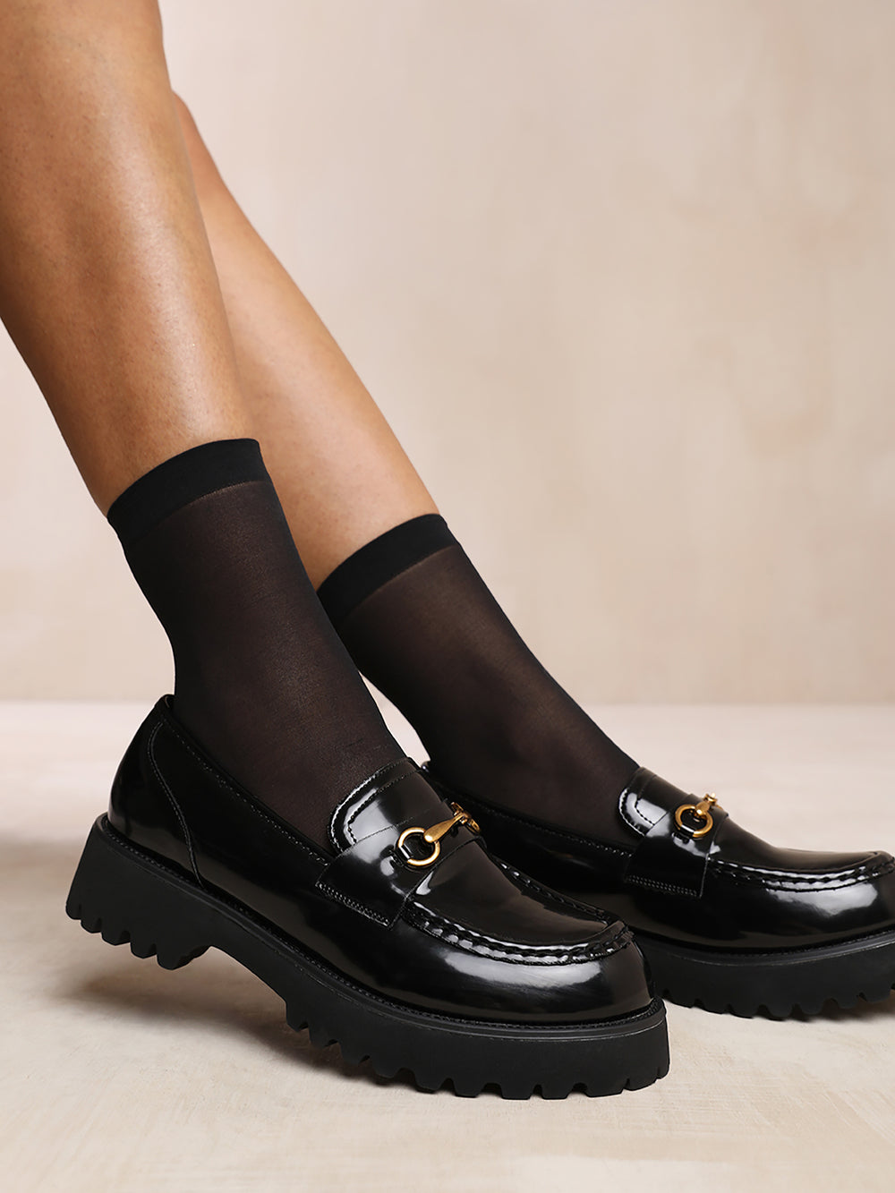 MURIEL CHUNKY SOLE SLIP ON LOAFERS WITH METAL DETAIL IN BLACK PATENT