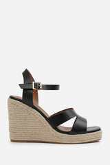 SANSA WIDE FIT CUT OUT STRAP DETAIL WEDGE SHOES WITH BUCKLE CLOSURE IN BLACK GRAIN PU