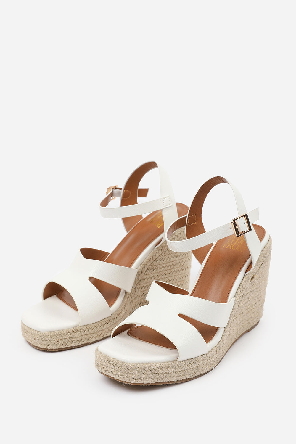 SANSA WIDE FIT CUT OUT STRAP DETAIL WEDGE SHOES WITH BUCKLE CLOSURE IN WHITE GRAIN PU