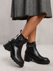 LYRIC ANKLE BOOT WITH CHUNKY SOLE AND BUCKLE DETAIL IN BLACK FAUX LEATHER