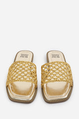 CHELSEA WOVEN STRAP DETAIL FLAT SANDALS IN GOLD FAUX LEATHER