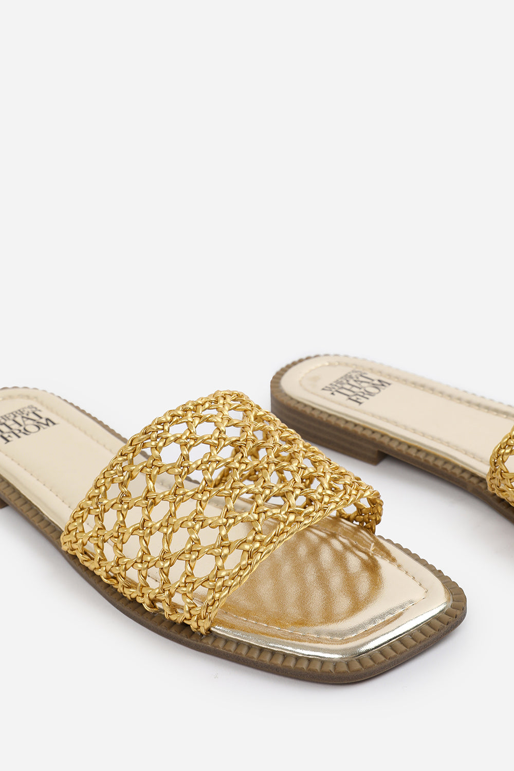 CHELSEA WOVEN STRAP DETAIL FLAT SANDALS IN GOLD FAUX LEATHER