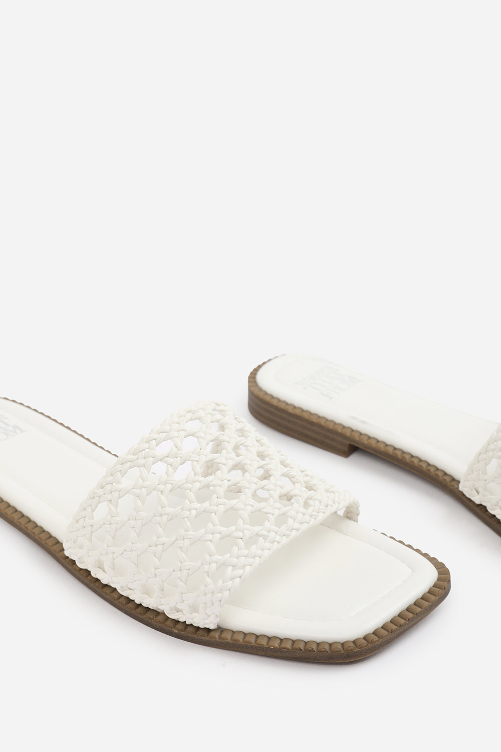 CHELSEA WOVEN STRAP DETAIL FLAT SANDALS IN WHITE FAUX LEATHER