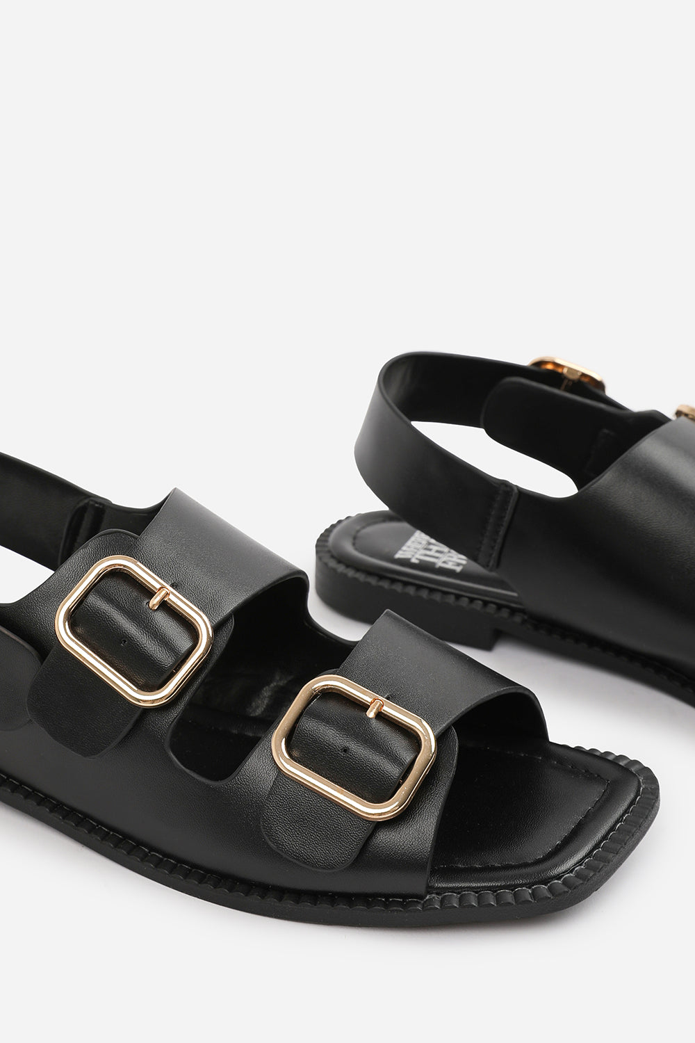 CHER FLATFORM SANDAL WITH MULTI BUCKLES STRAP DETAIL IN BLACK FAUX LEATHER