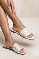 SYCAMORE FLAT SANDALS WITH TEXTURED SINGLE BAND IN NUDE FAUX LEATHER