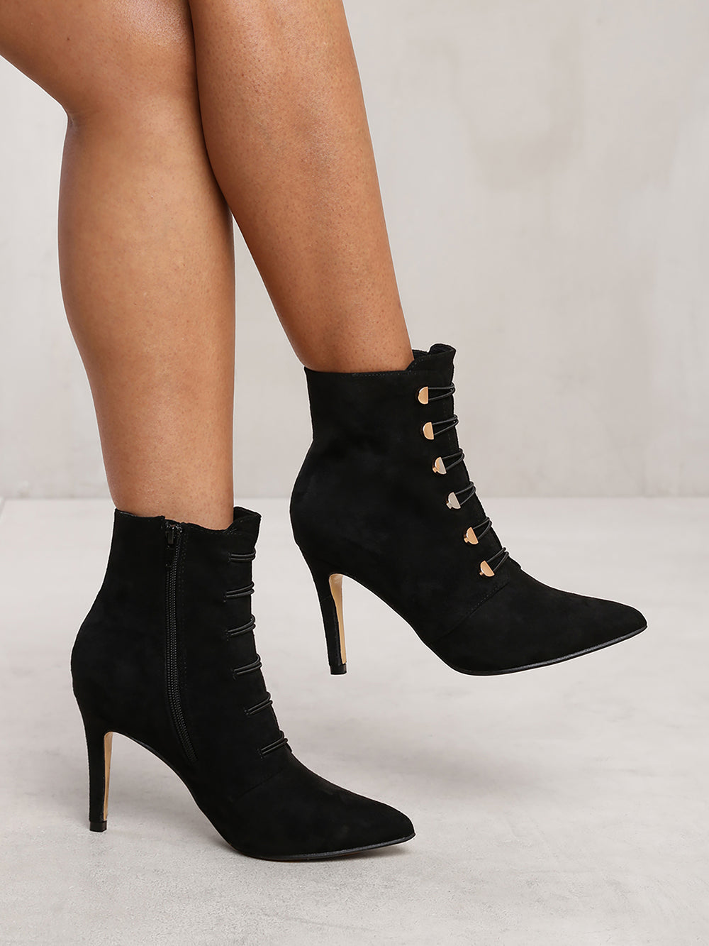 BLYTHE POINTED TOE MID HEEL ANKLE BOOTS WITH GOLD BUTTONS IN BLACK FAUX SUEDE