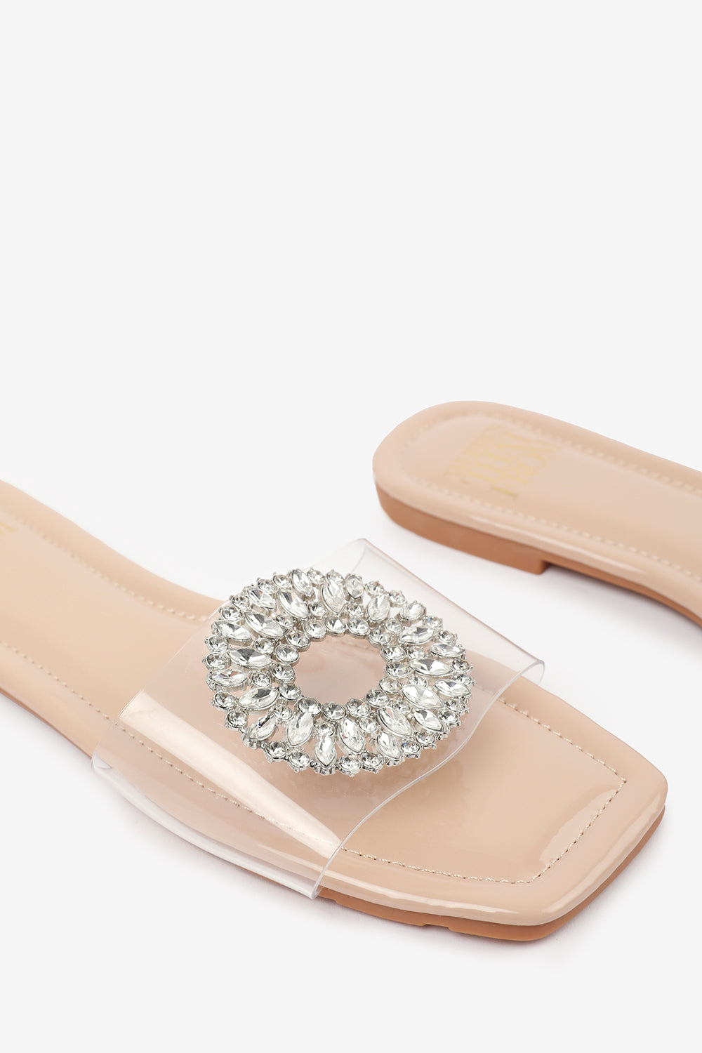 GLOSS PERSPEX FLAT SANDALS WITH SPARKLY GEMS DETAILING IN NUDE PATENT