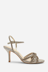 Pexina Diamante Knot Strappy Heels In Light Gold Shimmer