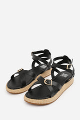 ALORA WIDE FIT CROSS OVER BUCKLE STRAP SANDALS IN BLACK FAUX LEATHER