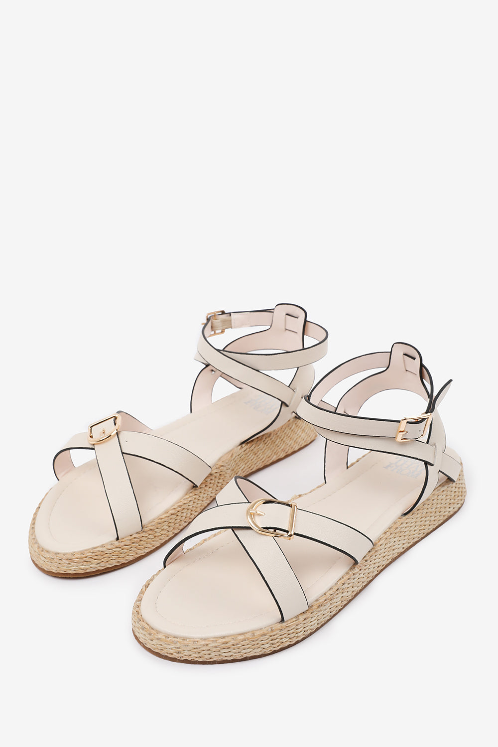 ALORA CROSS OVER BUCKLE STRAP SANDALS IN CREAM FAUX LEATHER