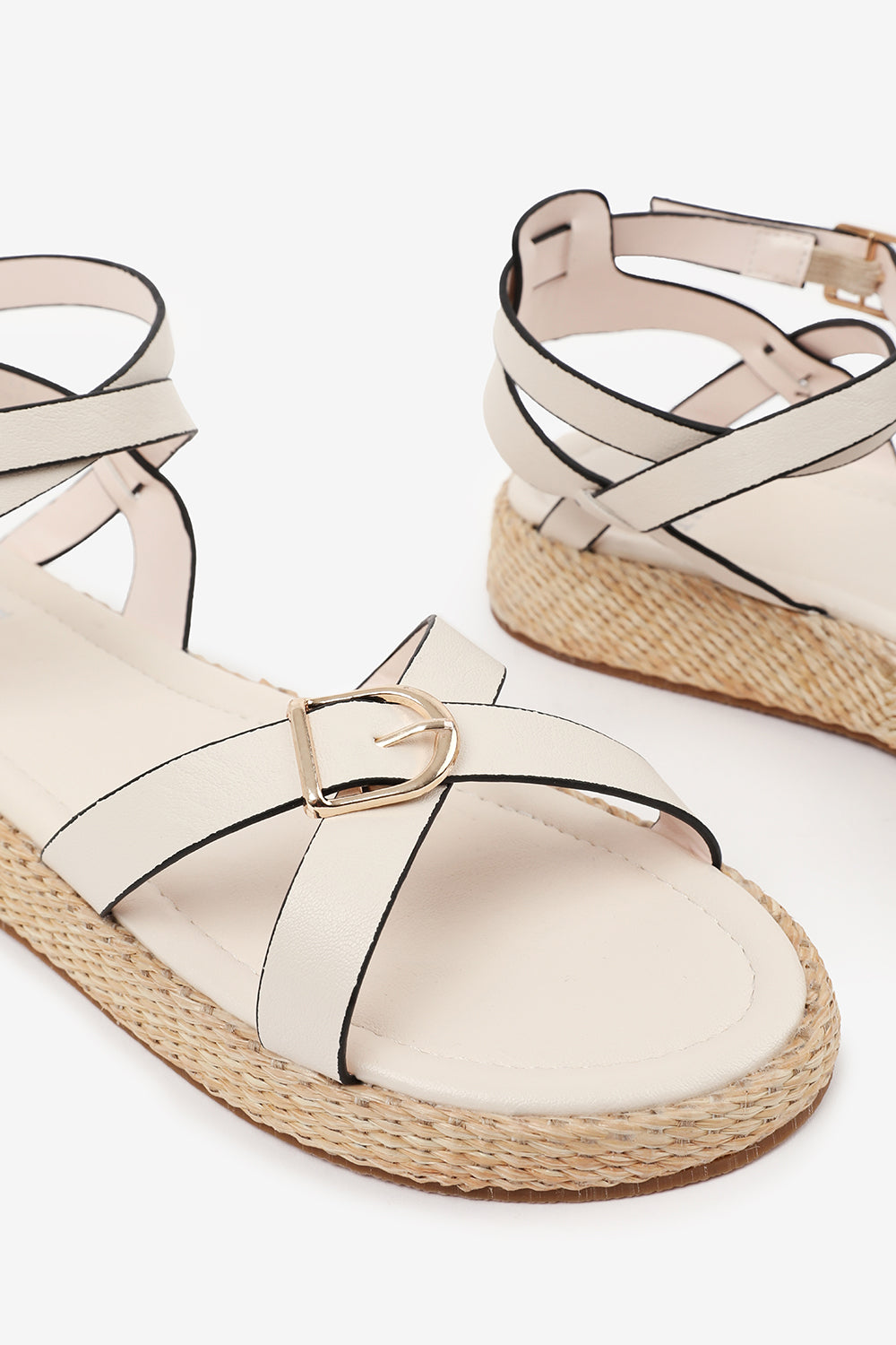 ALORA CROSS OVER BUCKLE STRAP SANDALS IN CREAM FAUX LEATHER