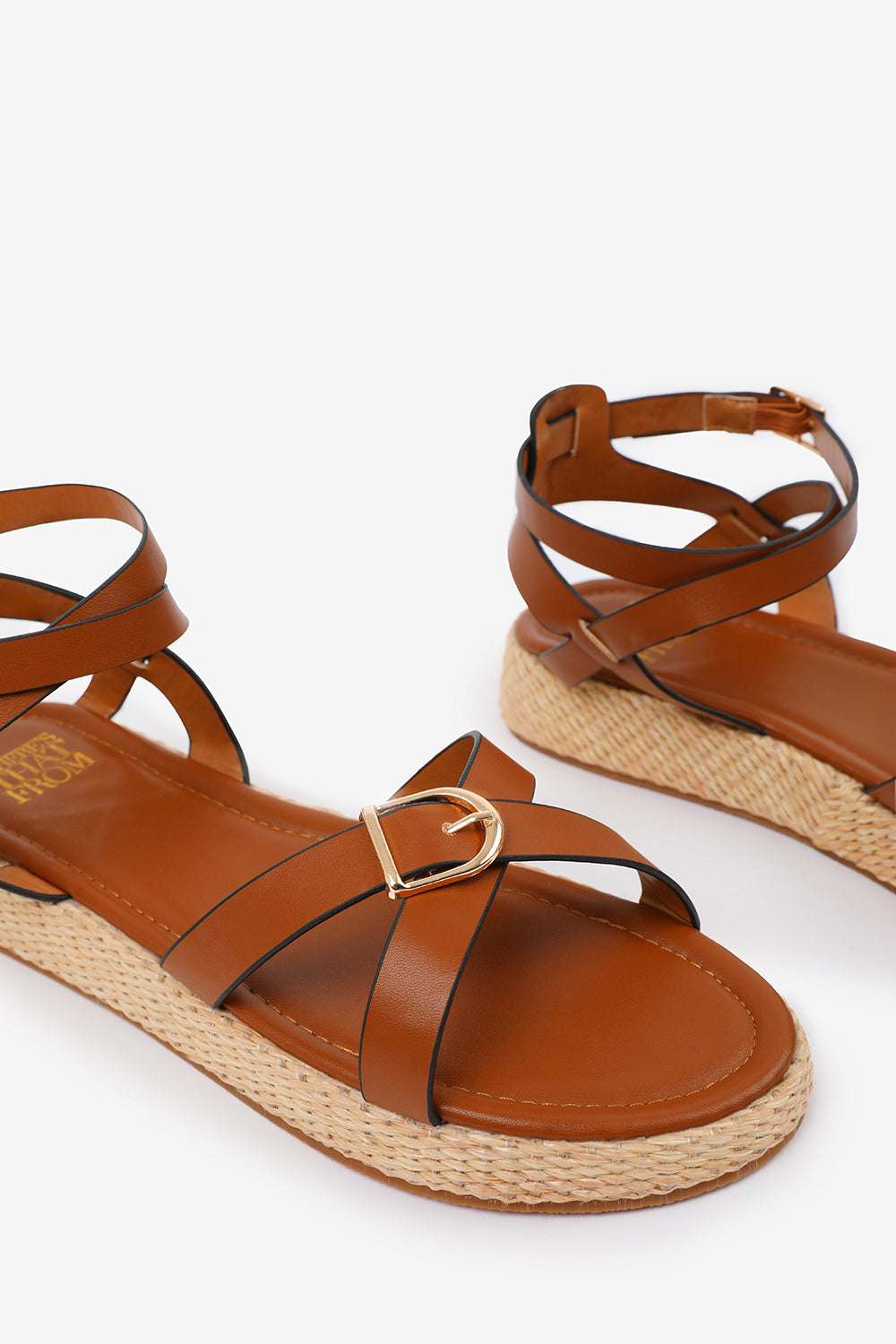 ALORA CROSS OVER BUCKLE STRAP SANDALS IN TAN FAUX LEATHER