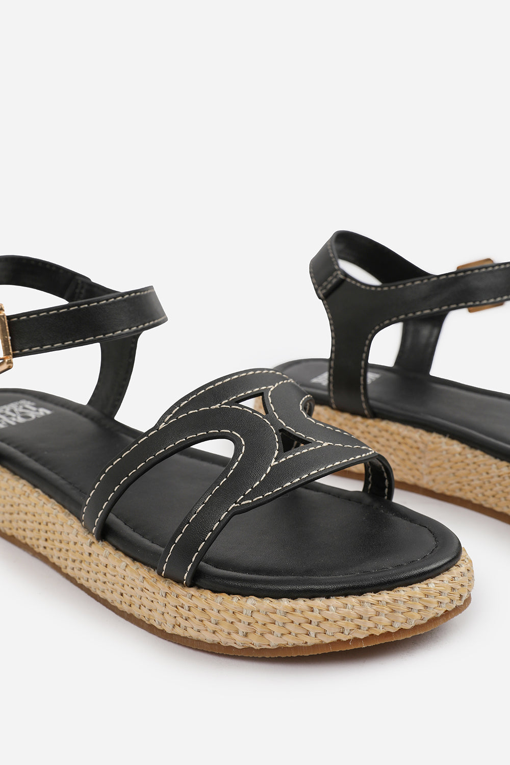 SOFIA FLATFORM SANDAL WITH STYLISH CUT STRAP DETAIL IN BLACK FAUX LEATHER