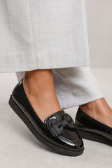 ALPHA WIDE FIT SLIP ON LOAFER SLIDER WITH BOW DETAIL IN BLACK PATENT FAUX LEATHER