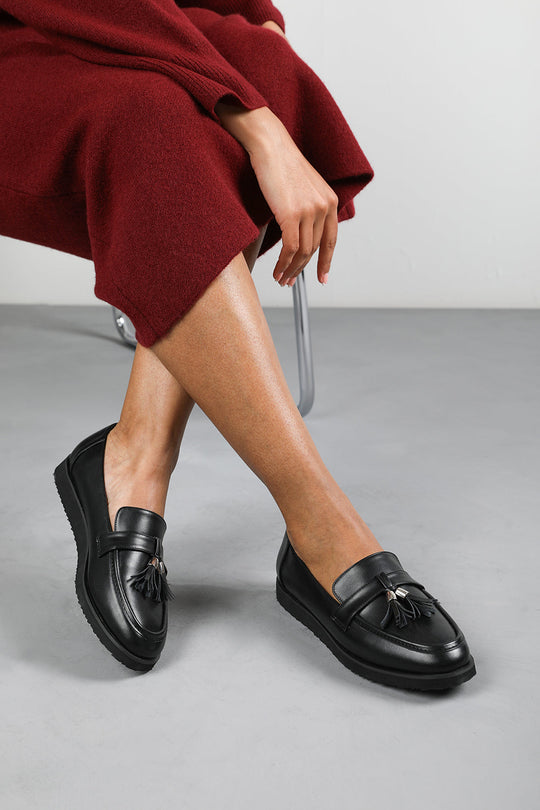 Kennedy Wide Fit Tasseled Loafers in Black Faux Leather