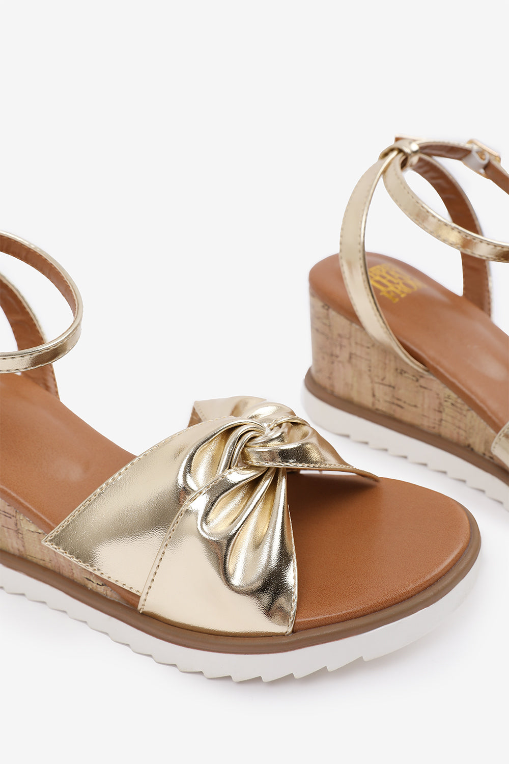 KATARA KNOT DETAIL WEDGE SHOES WITH BUCKLE ANKLE STRAP IN GOLD METALLIC PU