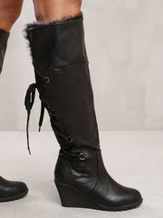 BRIDGET WEDGE HEEL MID CALF HIGH BOOTS WITH FUR & LACE UP DETAIL IN BLACK FAUX LEATHER